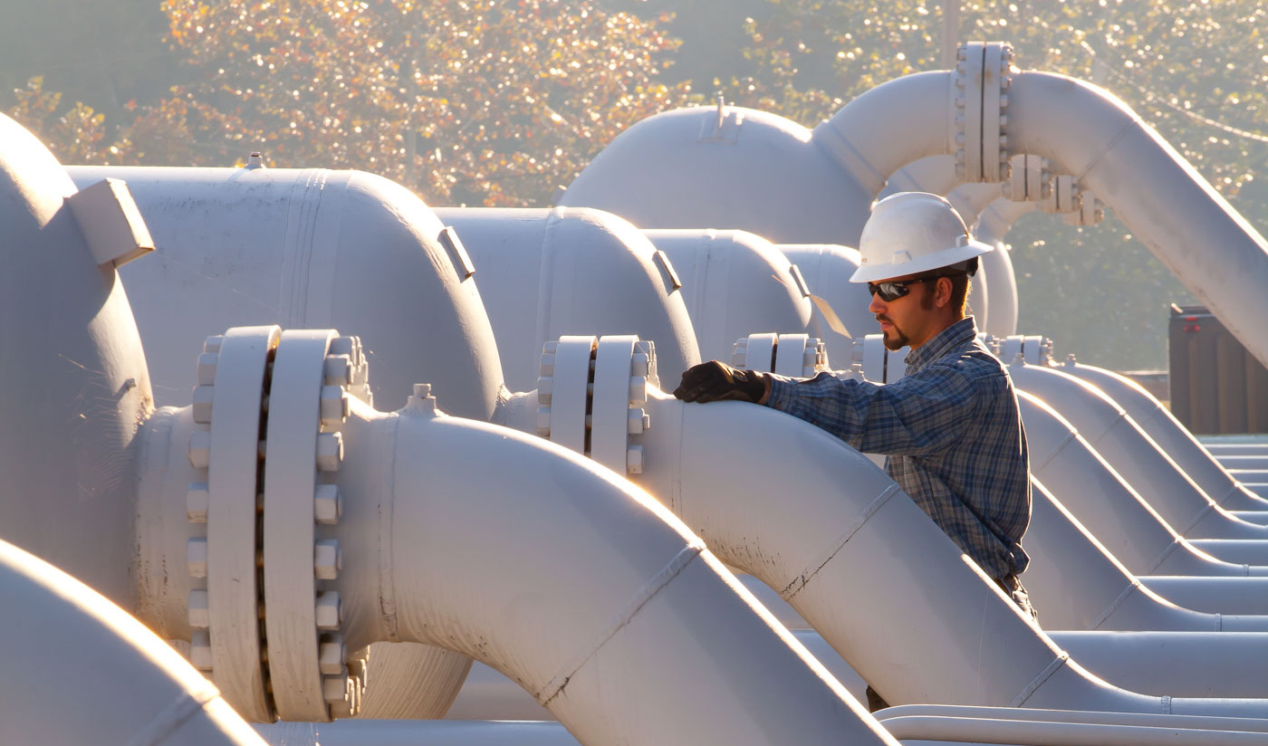Working inspecting a pipeline